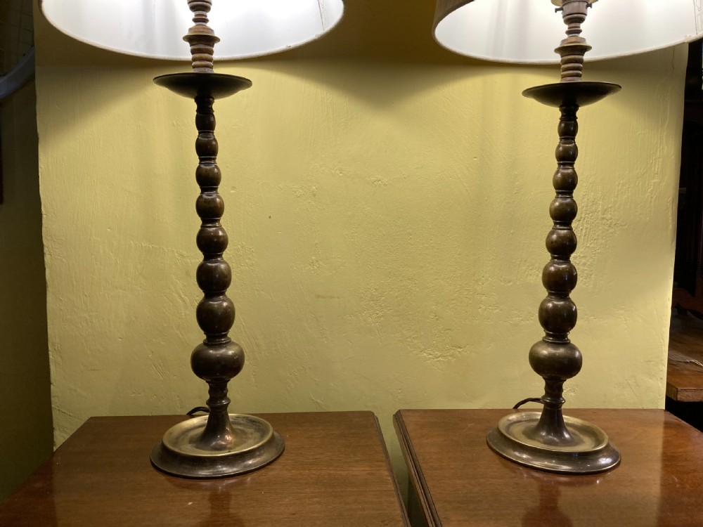 A pair of 19th century patinated brass bobbin table lamps View III