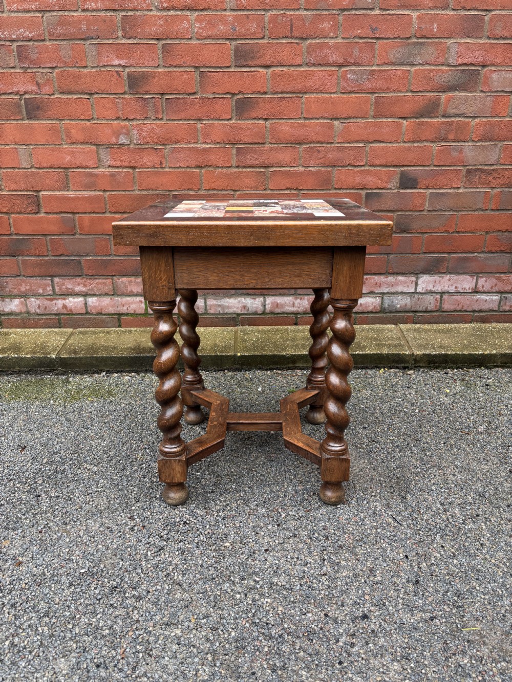 A 19th-century oak side table featuring a chequered specimen marble inset top supported by four barley twist legs and joined stretchers. View III