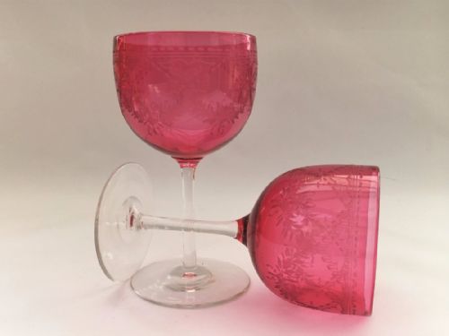 A Lovely Pair of Victorian Cranberry Bowl Engraved Wine Glasses