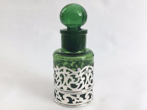 A Stunning Victorian Pierced Silver Bottle Holder.