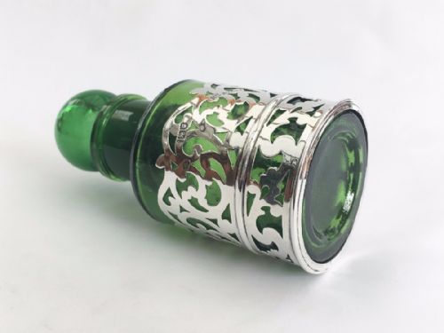 fig 1. A stunning Victorian pierced silver bottle holder.