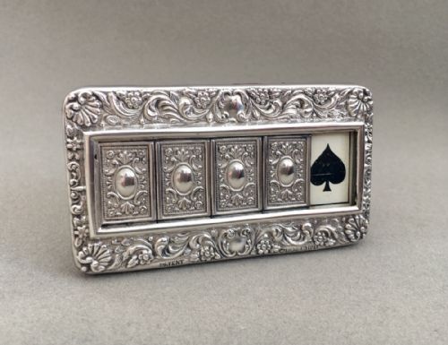 An Extremely Rare Sliding Silver Trump Marker.