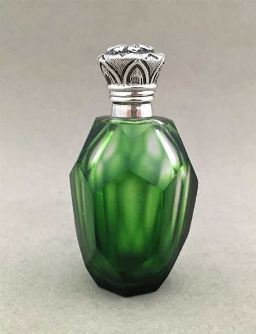 A Wonderful Emerald Green Silver Mounted Scent Bottle