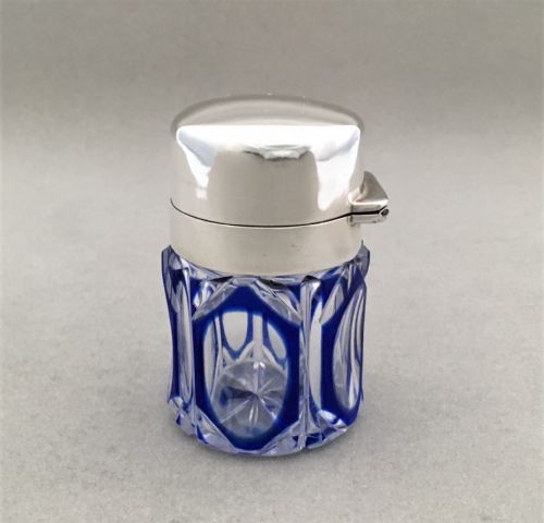 fig 1. A silver mounted bristol blue cut through scent bottle