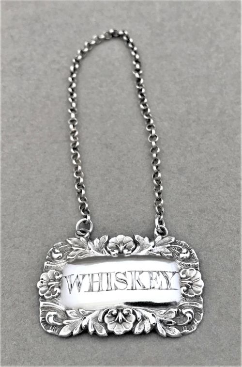 A Silver Whiskey Decanter Label from 1845