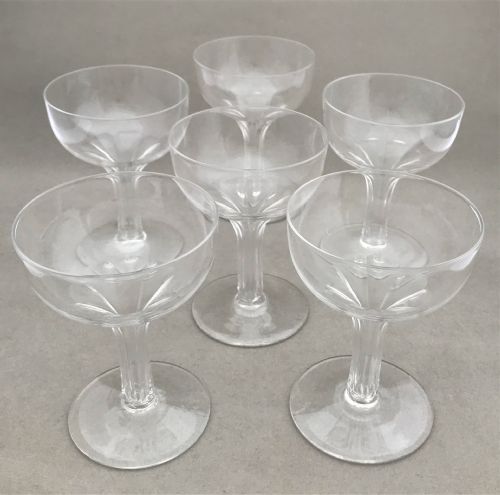 A Set of Six Victorian Hollow Stem Champagne Glasses