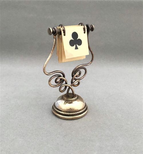 fig 1. A gorgeous Art Nouveau Brass trump marker