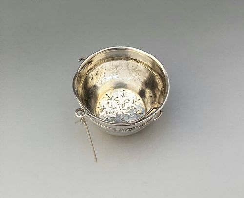 fig 1. An attractive French silver tea strainer