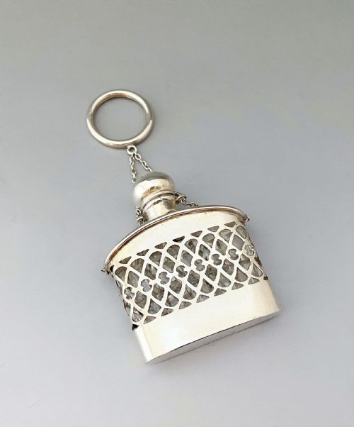A Gorgeous Silver Cased, Cut Glass Scent Bottle