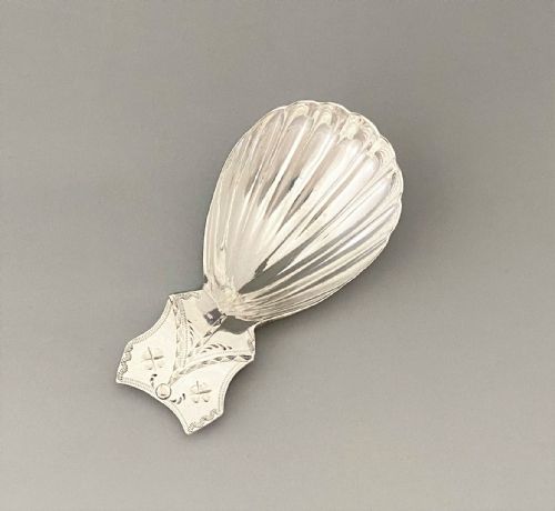 A Charming Georgian Bright Cut Silver Caddy Spoon