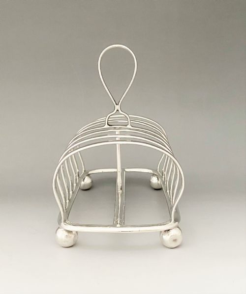 fig 1. A superior Mappin & Webb George V silver toast rack