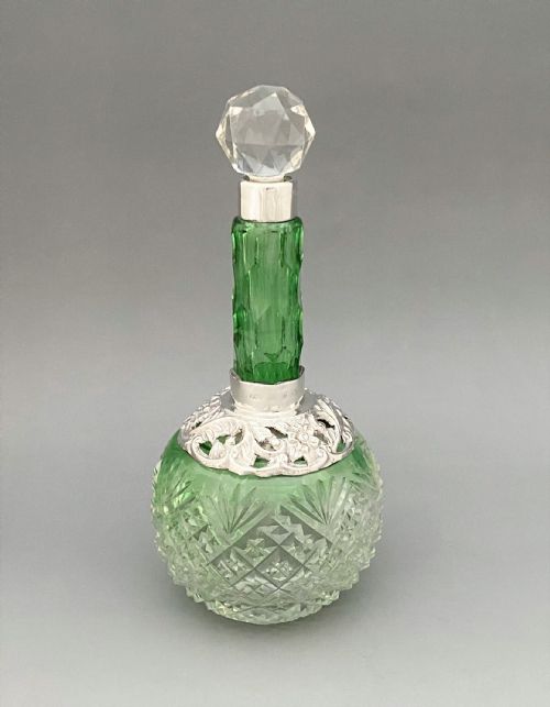 A Gorgeous Victorian Silver Mounted Cologne Bottle