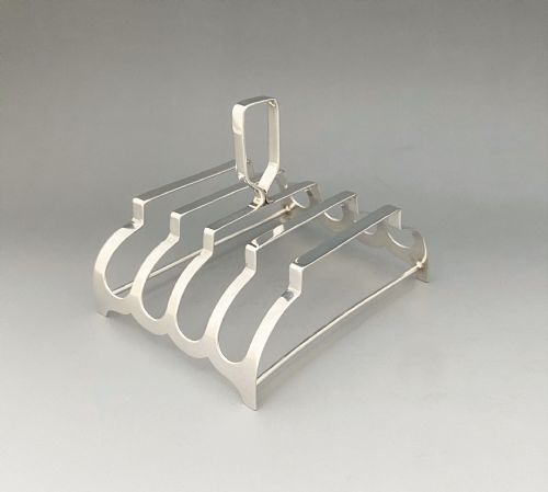 A Most Unusual Art Deco Silver Four Slice Toast Rack