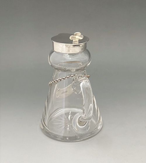 fig 1. A handsome silver Whisky tot with silver label