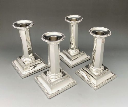 fig 1. A rare set of four Art Deco silver candlesticks