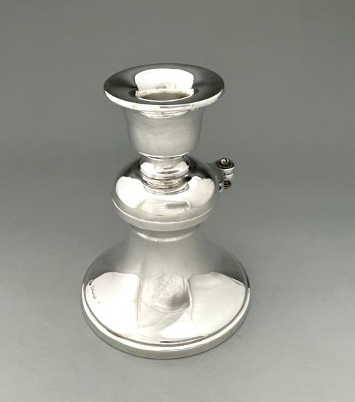 An Unusual Silver Inkwell/ Candle Holder Combo