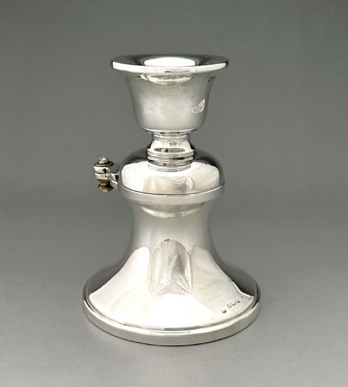 fig 2. An unusual silver inkwell/ candle holder combo