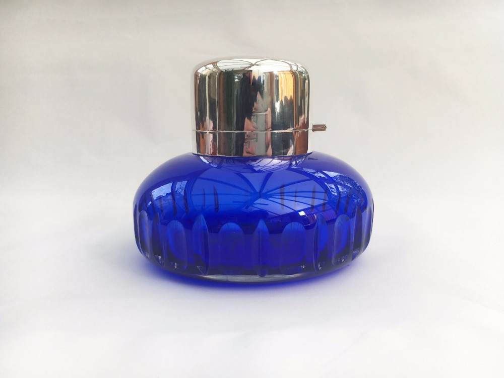 A stunning large Victorian silver mounted cologne bottle.