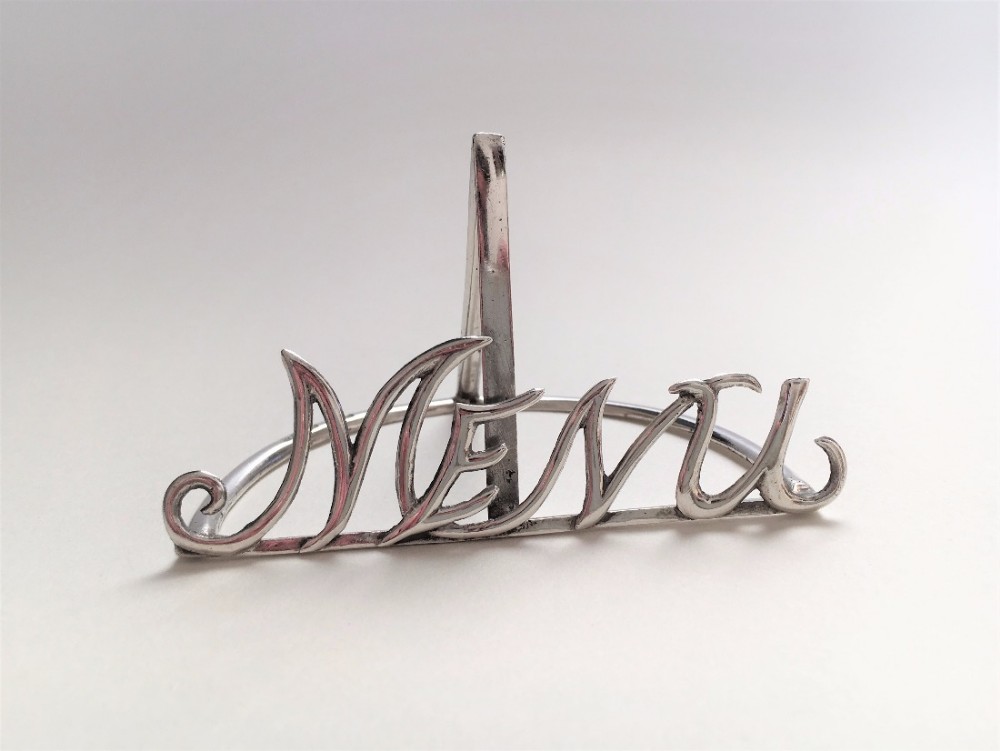 A wonderful Victorian Silver table menu holder.