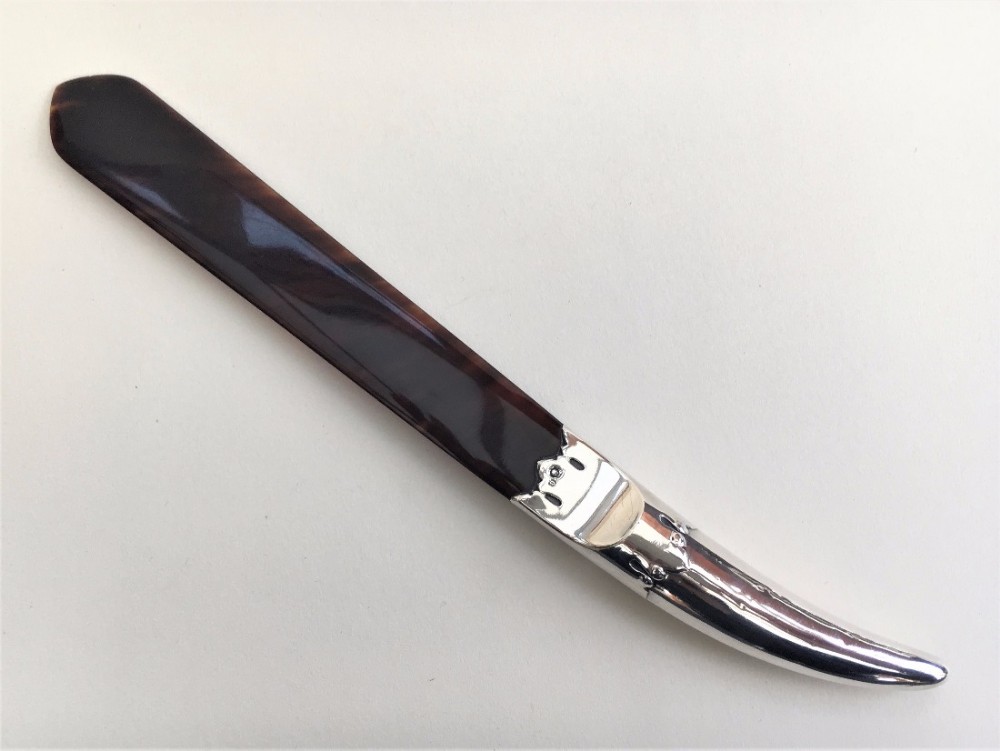 A stunning Edwardian silver & tortoiseshell letter opener.