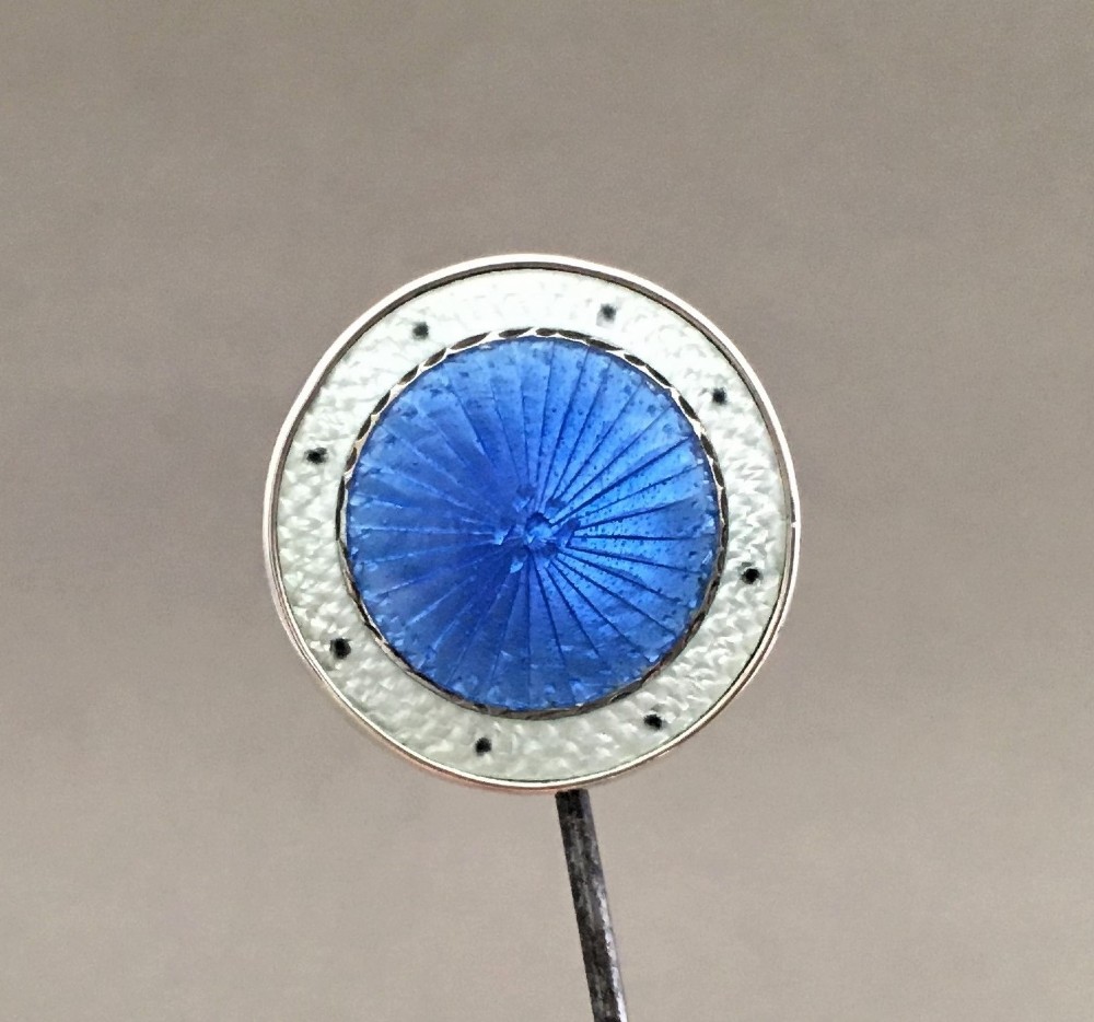 A stunning silver & guilloche enamel hat pin
