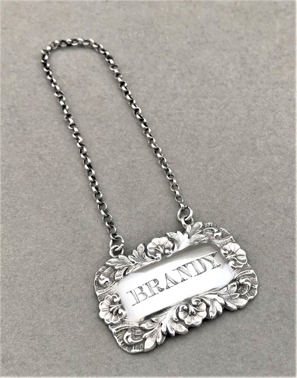 A silver Brandy decanter label from 1846