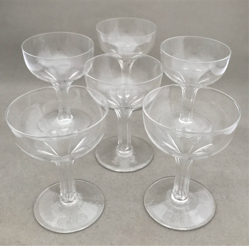 A set of six Victorian hollow stem champagne glasses