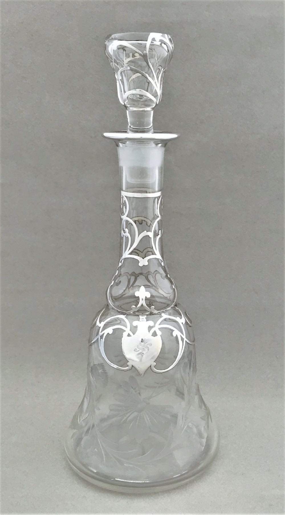 A gorgeous silver overlay decanter
