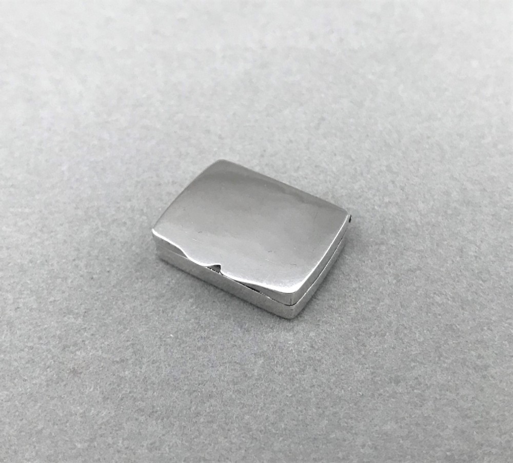A delightful small Edwardian silver pill box