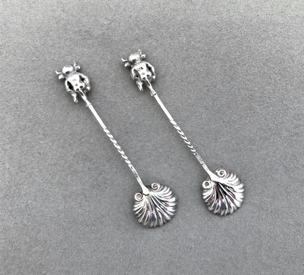 A rare pair of silver 'Lincoln Imp' salt spoons View II