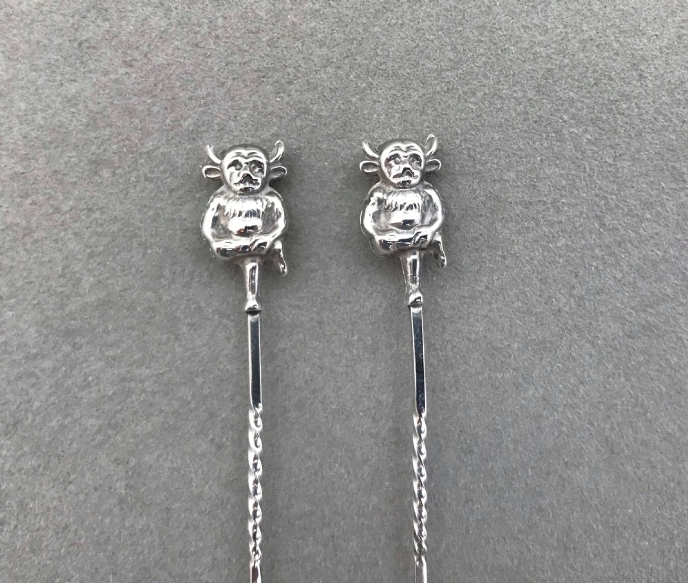 A rare pair of silver 'Lincoln Imp' salt spoons View IV