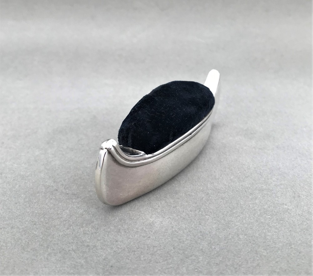 A rare Edwardian silver novelty 'canoe' pin cushion View V