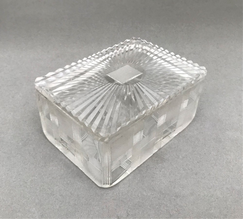 A stylish Art Deco cut glass butter dish