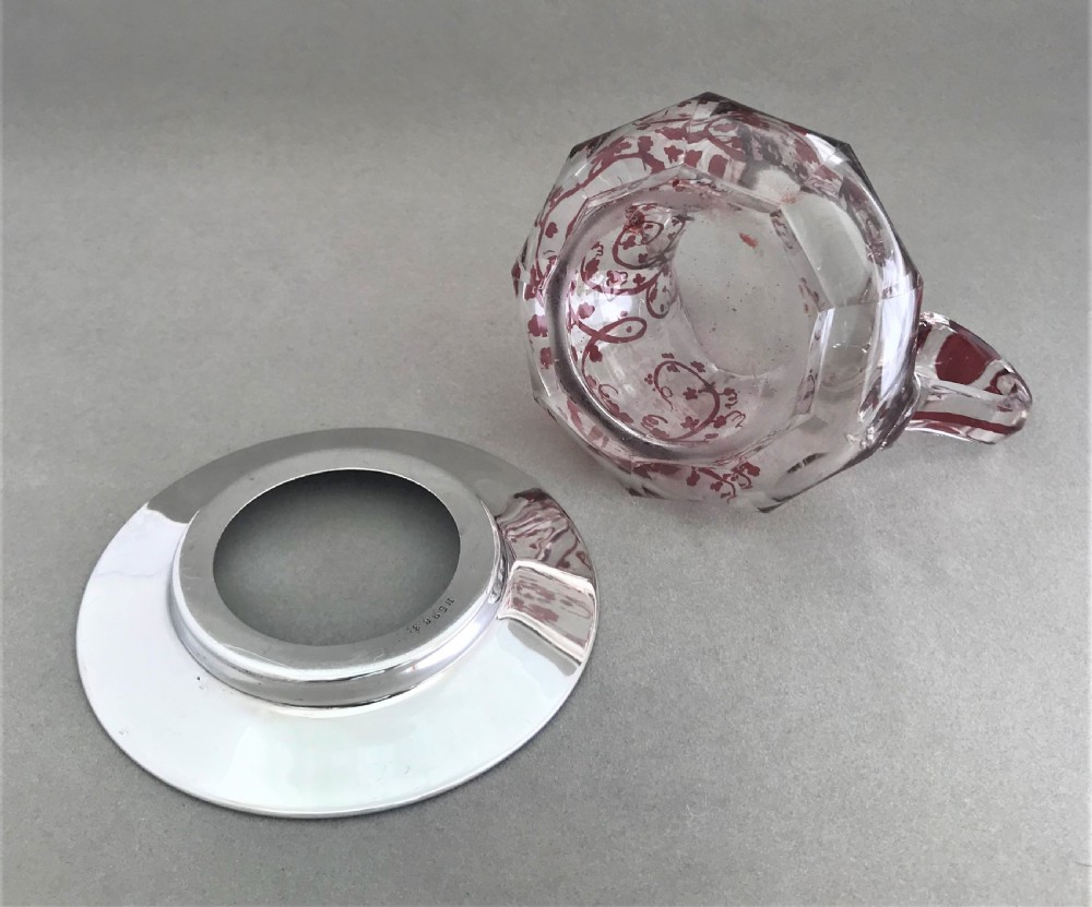 A gorgeous cut glass cream jug with silver drip saucer View VI