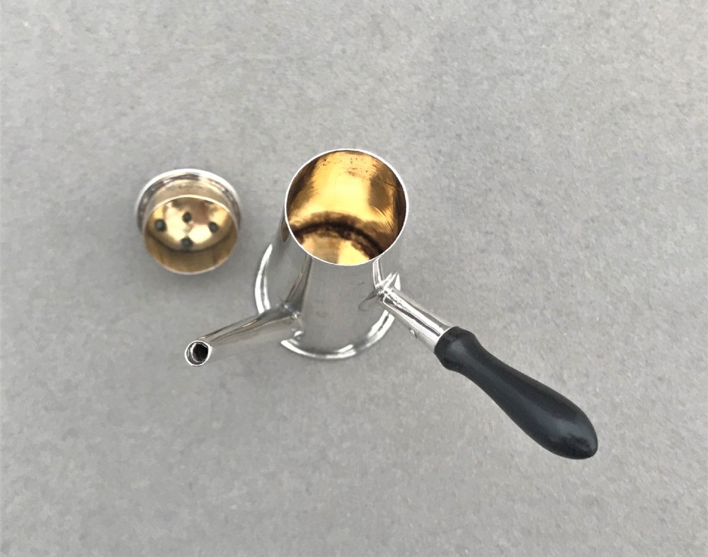 A charming novelty silver chocolate pot pepperette View V