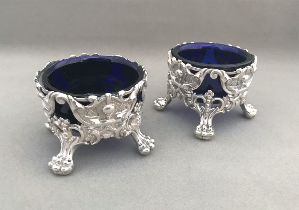 A magnificent pair of Victorian silver salt tubs & spoons View III