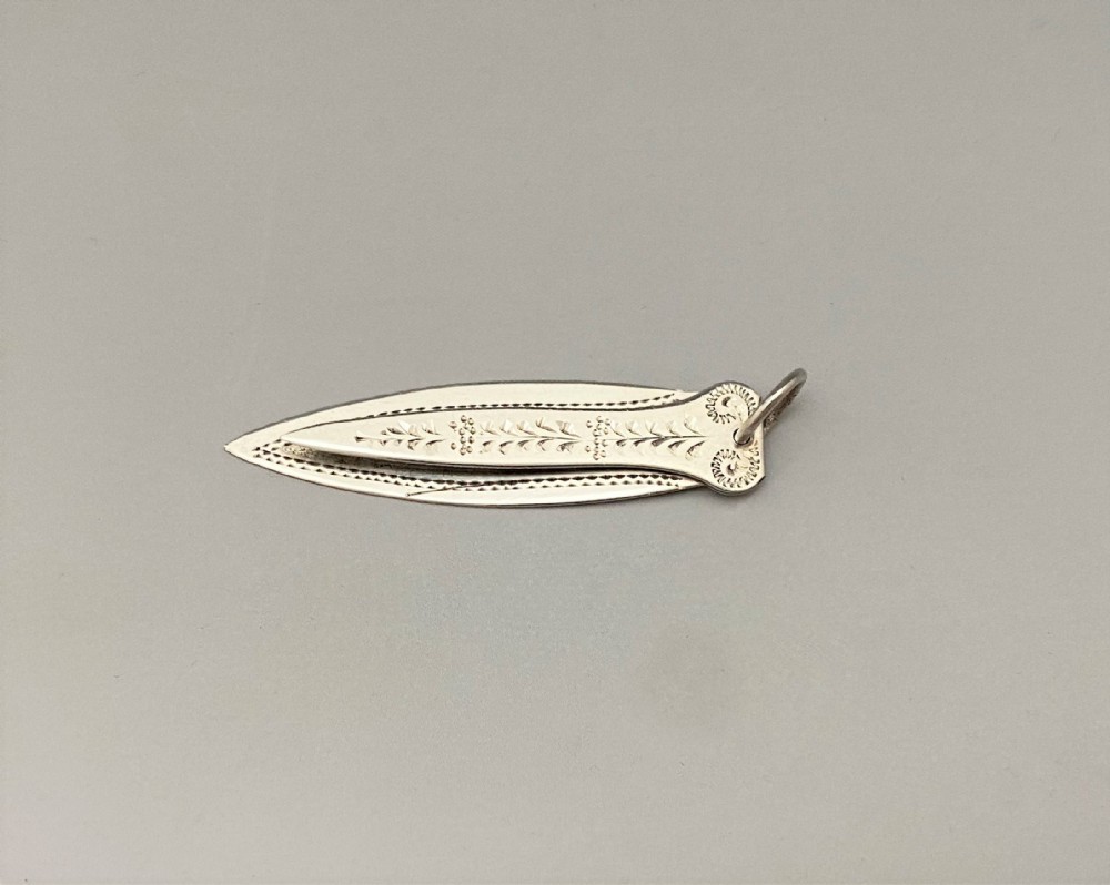 An unusual George V bright cut silver bookmark