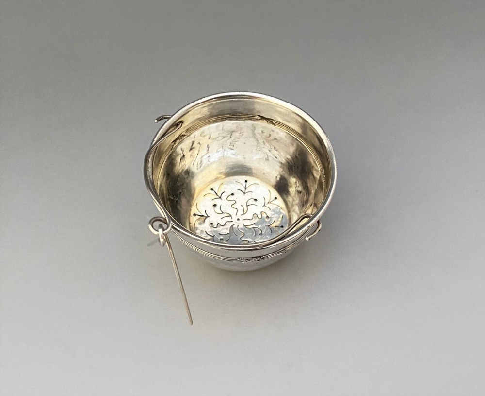 An attractive French silver tea strainer View II