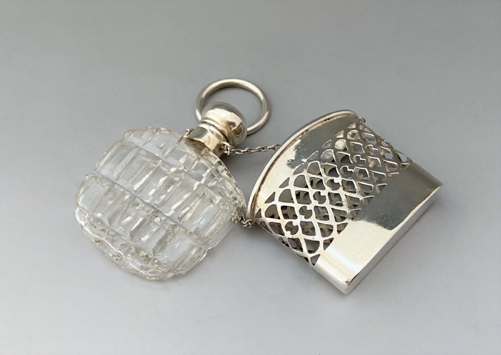 A gorgeous silver cased, cut glass scent bottle View IV