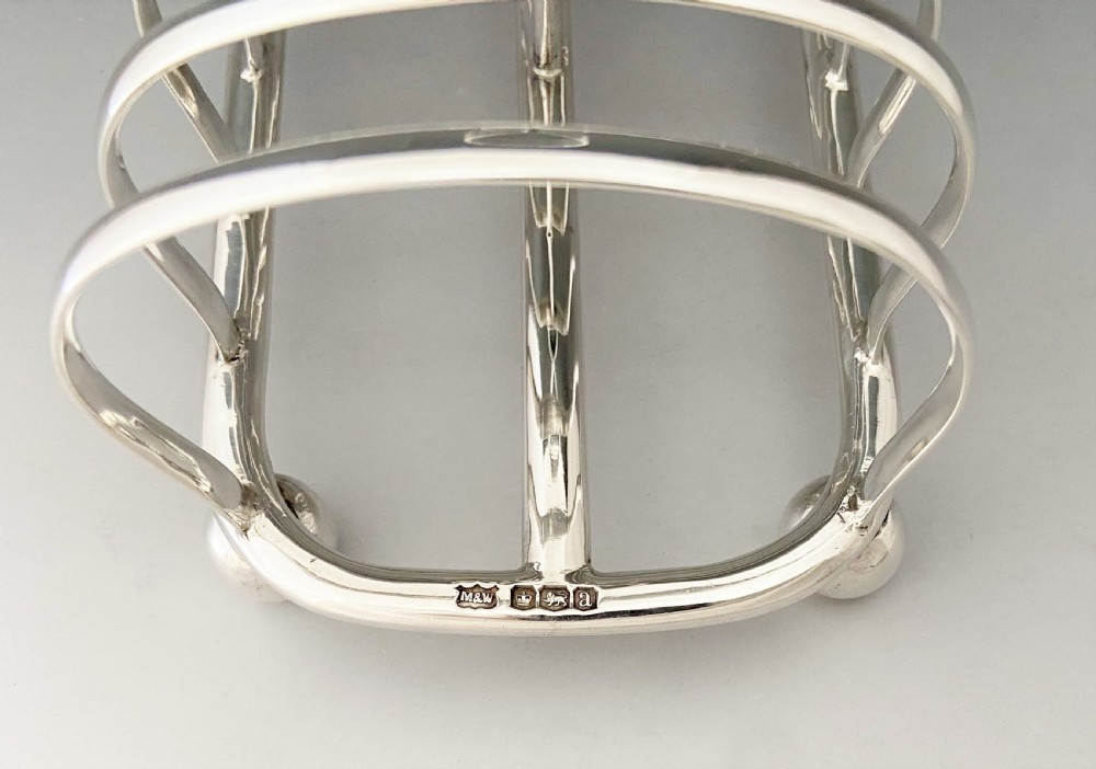 A superior Mappin & Webb George V silver toast rack View V