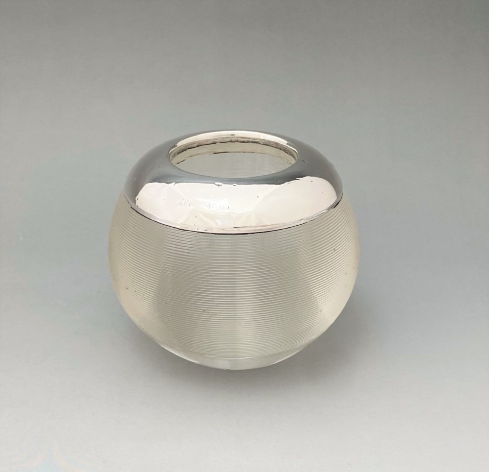 A very large silver mounted match striker