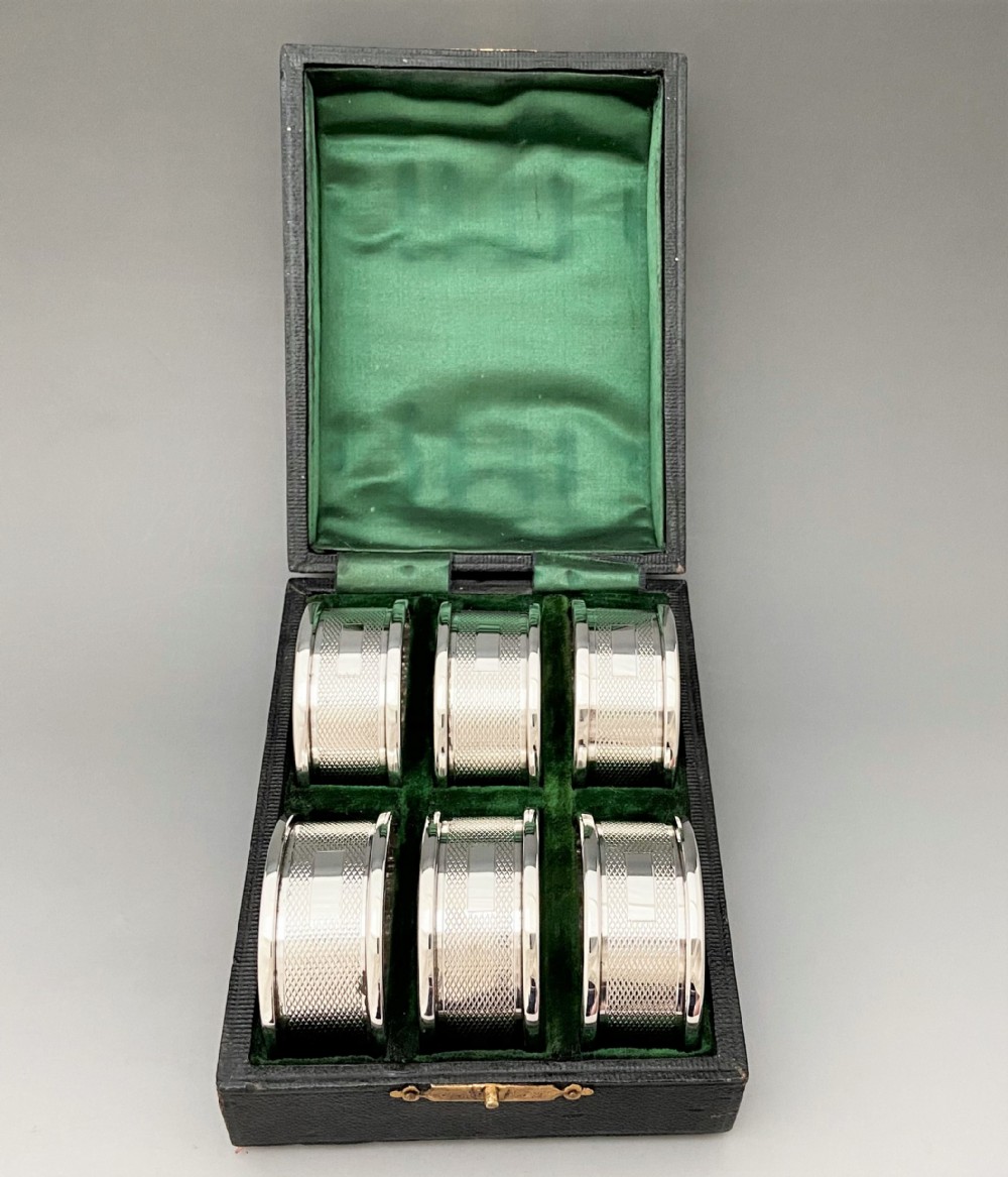 A rare boxed set of 6 Art Deco silver napkin rings