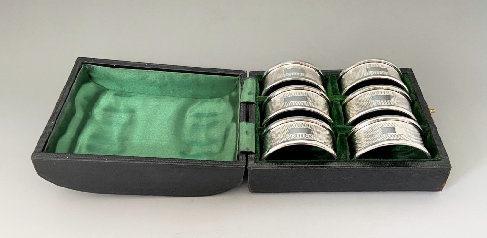 A rare boxed set of 6 Art Deco silver napkin rings View III