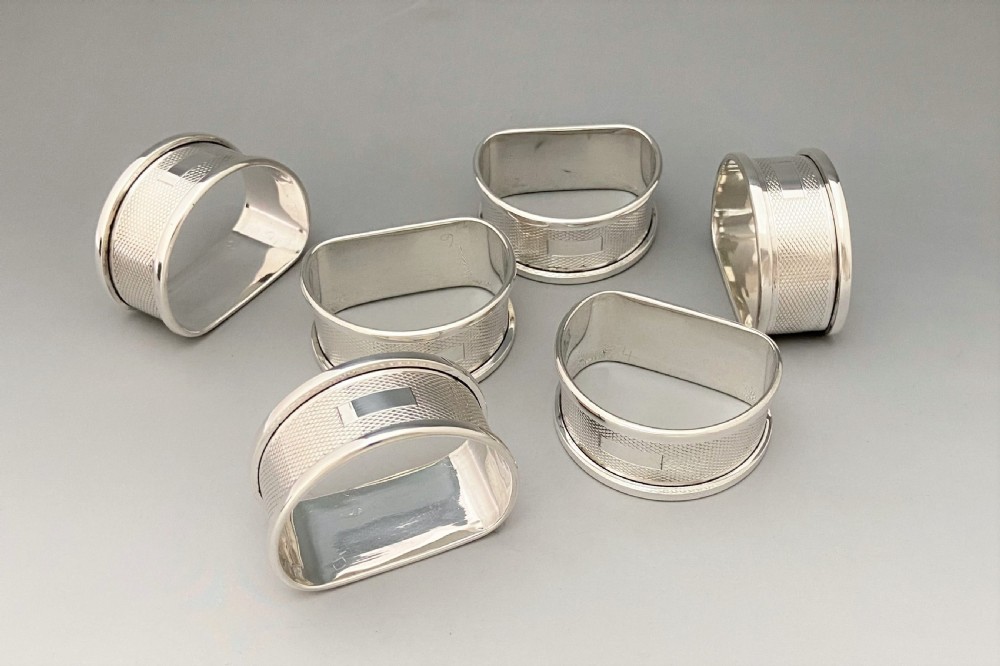 A rare boxed set of 6 Art Deco silver napkin rings View IV