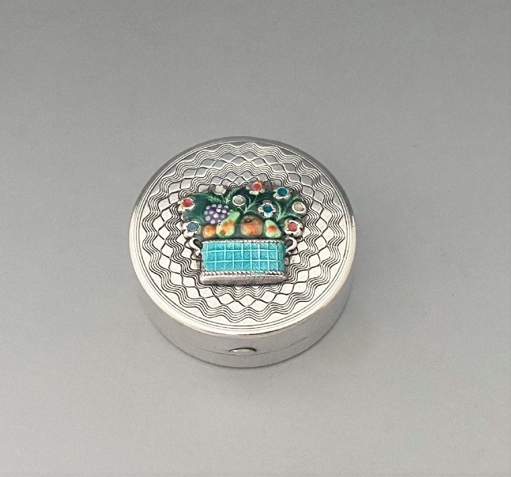 A stunning silver and enamel pillbox
