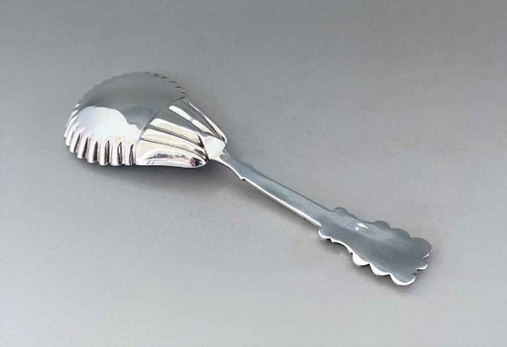 An unusual William IV silver caddy spoon View III