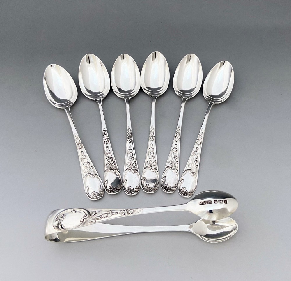 A lovely Edwardian boxed set of 6 teaspoons and matching tongs View VI