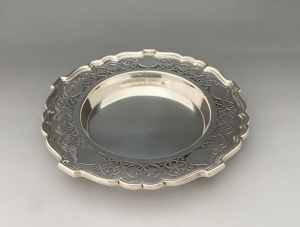A superb Edwardian silver bottle/decanter coaster View II