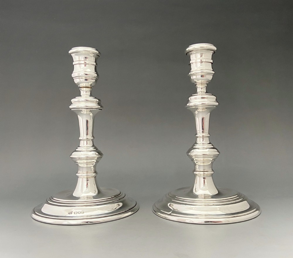 A handsome pair of George I style silver candlesticks View IV