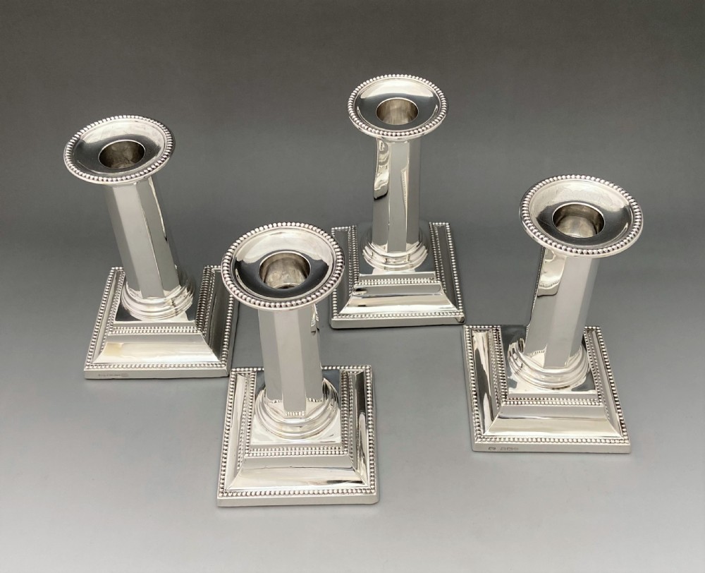 A rare set of four Art Deco silver candlesticks View III